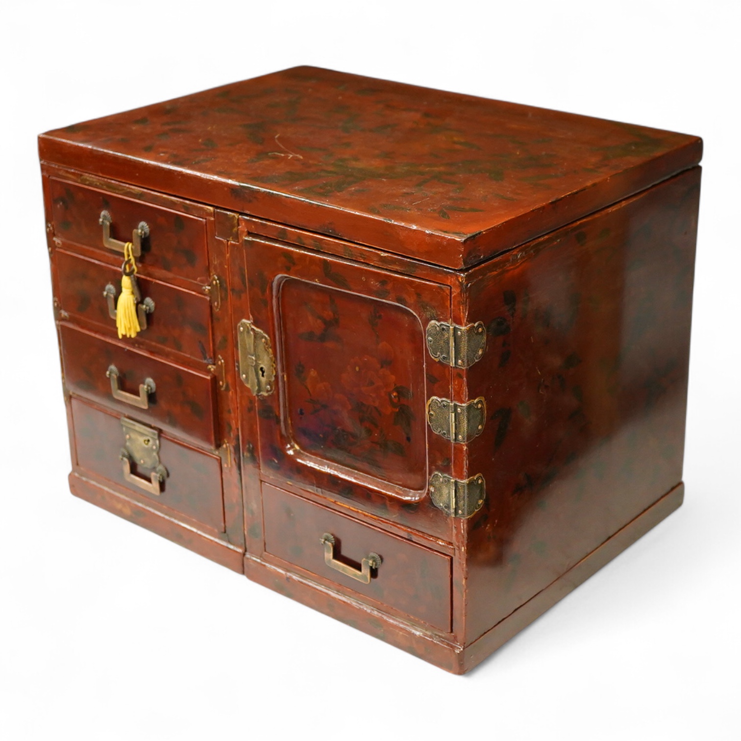 A Japanese floral lacquer table top cabinet, Taisho period, 36cm wide, the top panel is removable to form a twin pedestal cabinet